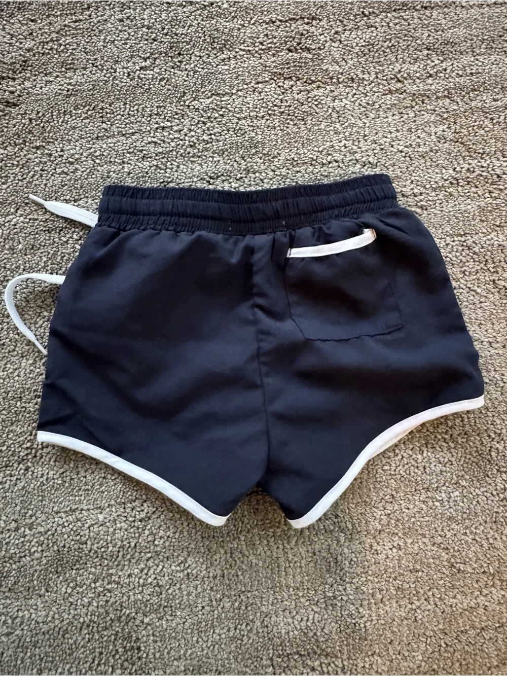 Toddler black swim Shorts with White Trim